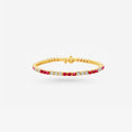 Peter Marco 18k yellow gold round cut diamond and ruby bracelet