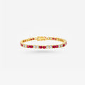 Peter Marco 18k yellow gold round cut diamond and ruby bracelet