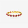 Peter Marco 18k yellow gold round cut ruby and diamond bracelet