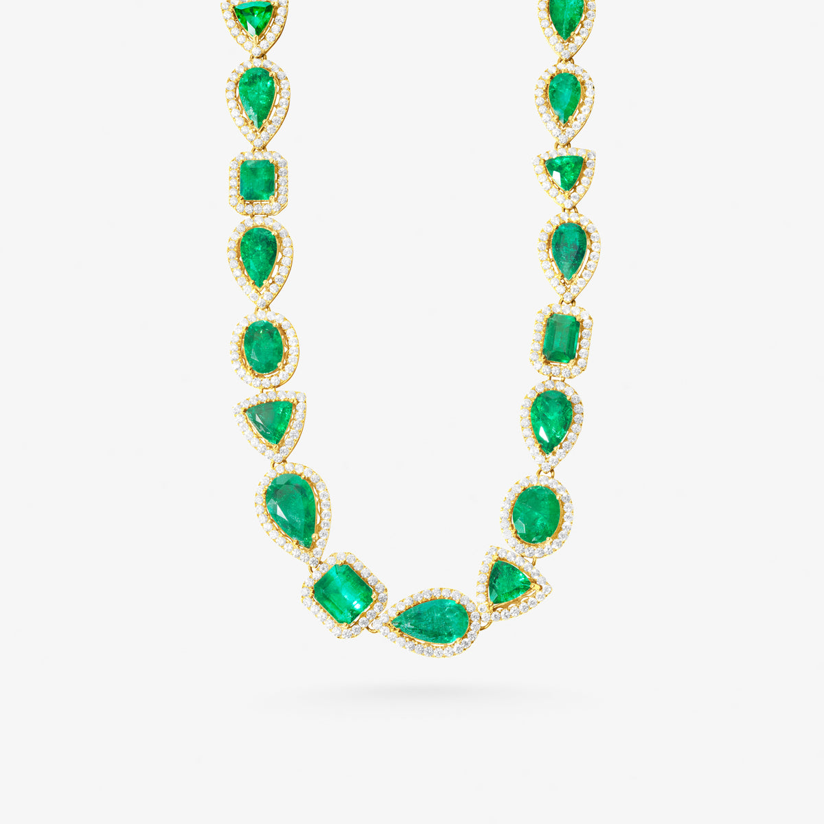 Peter Marco 18k yellow gold round cut white diamond and oval cut emerald marquise cut emerald cut necklace