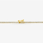 Peter Marco 18k yellow gold three-prong graduated round cut diamond necklace, clasp view