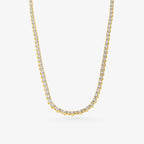 Peter Marco 18k yellow gold three-prong round cut diamond necklace
