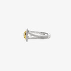 Yellow diamond and diamond ring in white and yellow gold, side view, 18K white gold.