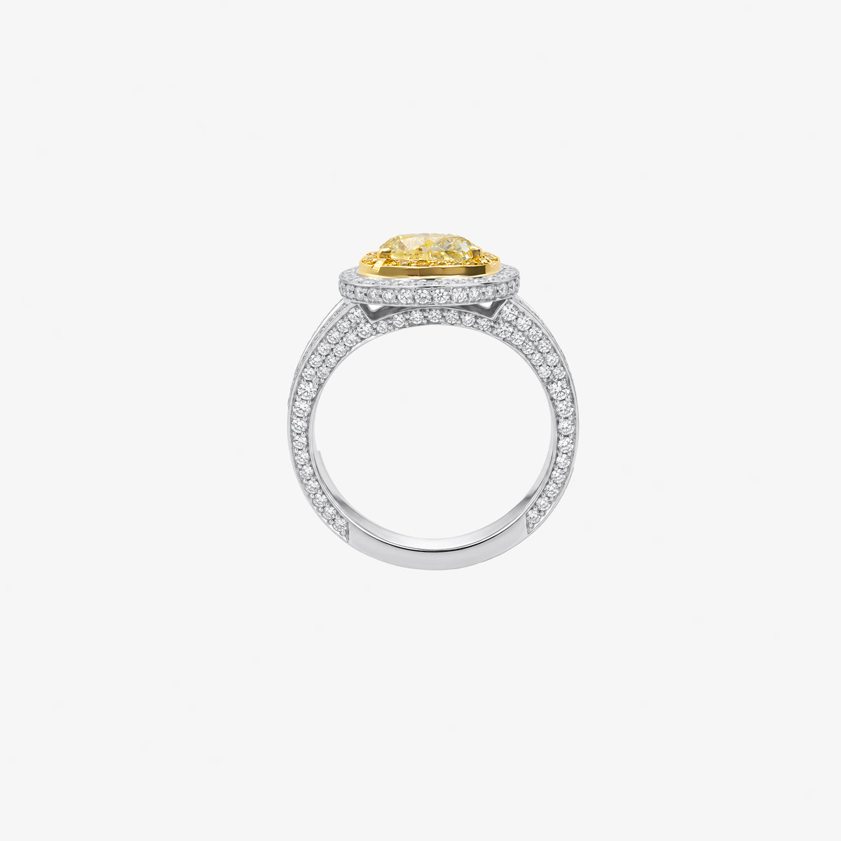 Yellow diamond and diamond ring in white and 18k yellow gold. Top view.