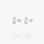 Peter Marco baguette and round cut diamond stud earrings, side view