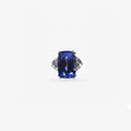 Peter Marco elongated blue sapphire ring with geometric diamond detailing on the shoulders