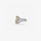 Peter Marco cushion cut yellow diamond and round cut diamond crossover ring, side view
