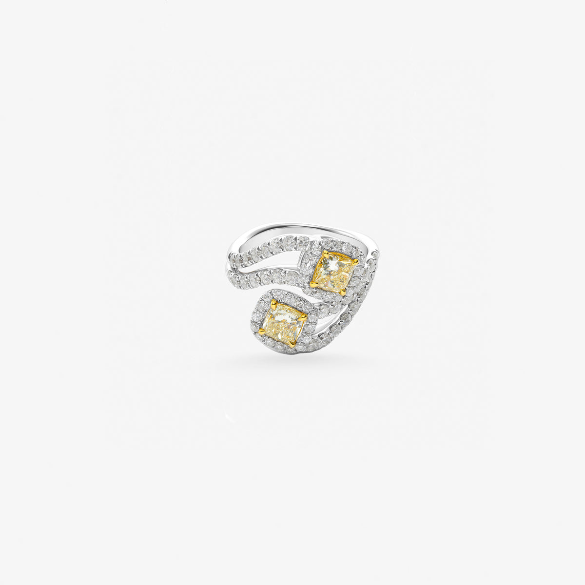 Peter Marco cushion cut yellow diamond and round cut diamond crossover ring