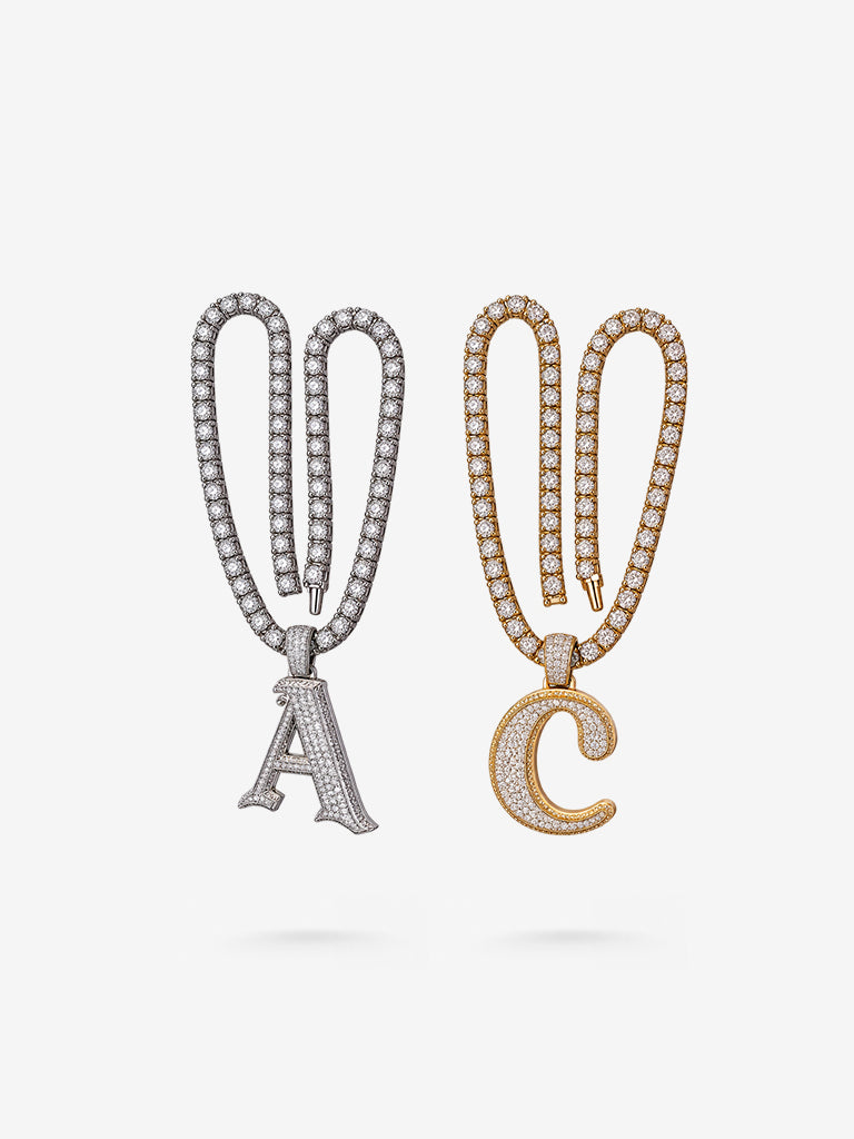 Peter Marco diamond A and C initial pendants with diamond chains in white and yellow gold for Jamie Foxx