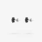 Peter Marco eight-prong round cut black diamond stud earrings, side view