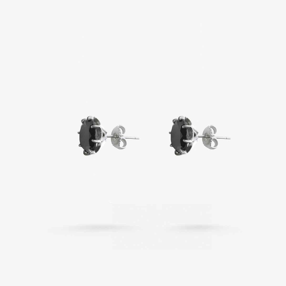 Peter Marco eight-prong round cut black diamond stud earrings, side view