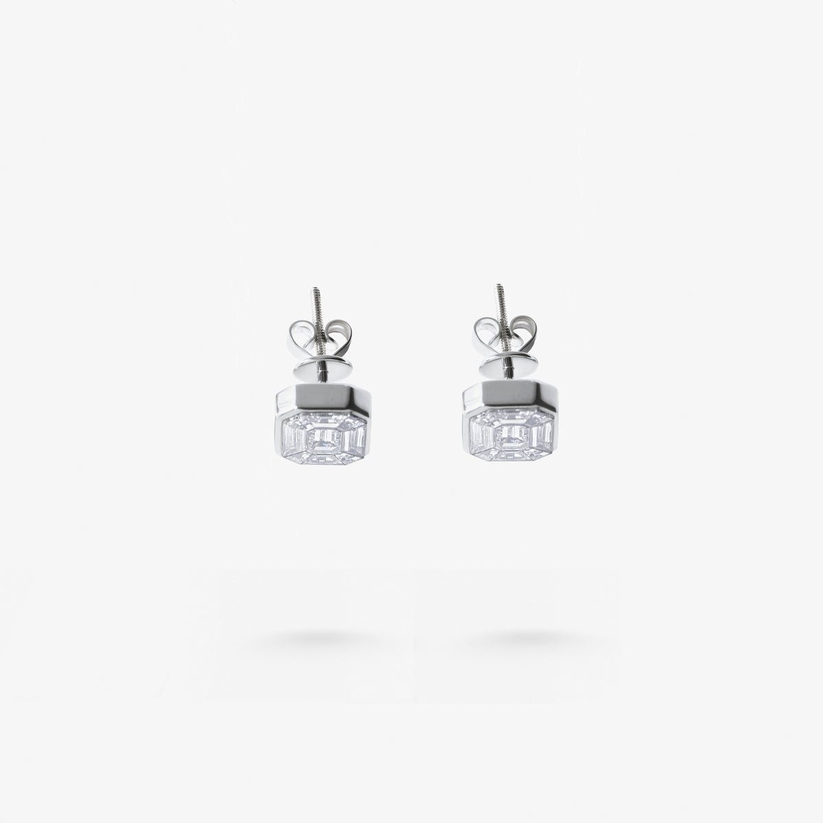 peter marco emerald cut and baguette cut diamond stud earrings, top down view