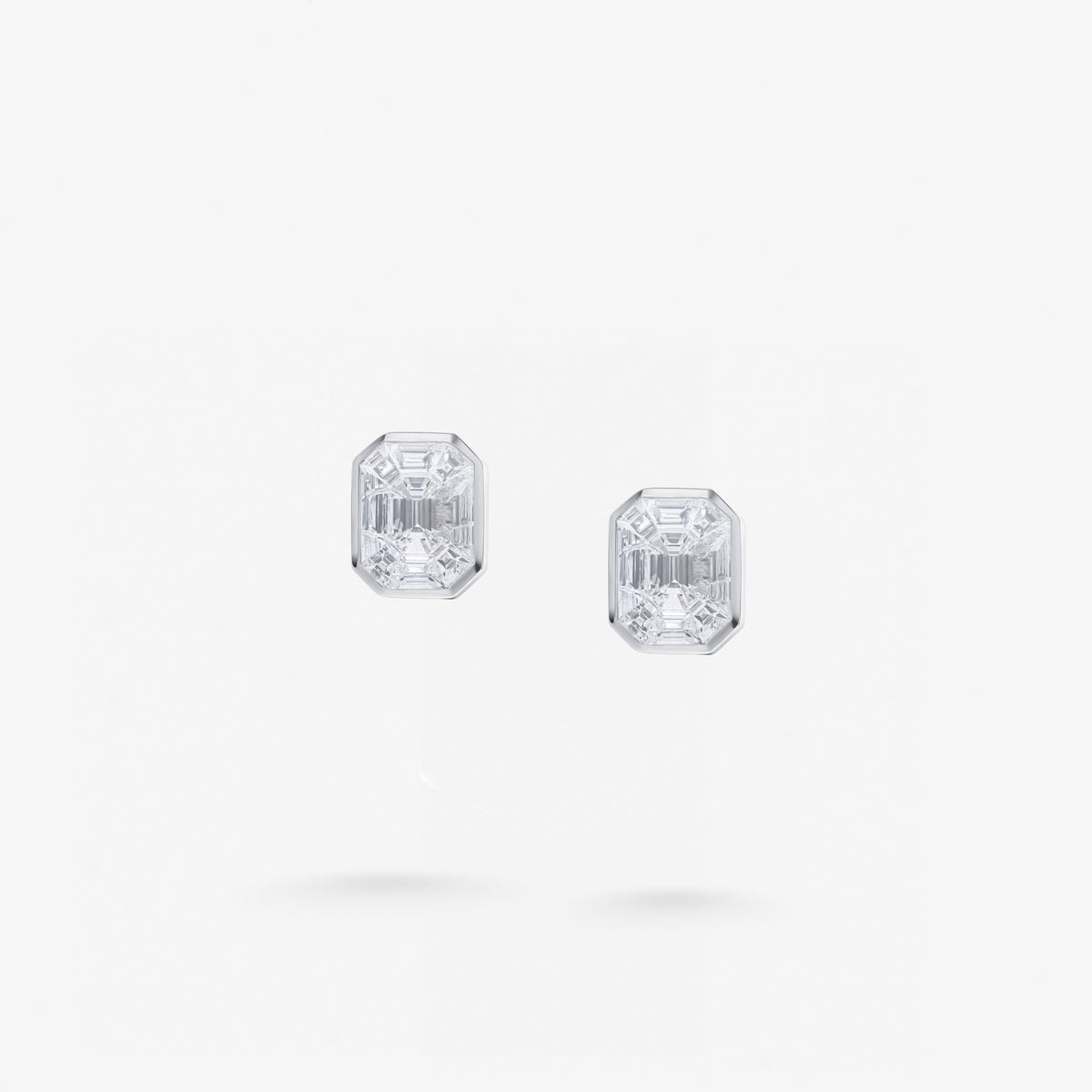 Peter Marco emerald cut and baguette cut diamond stud earrings