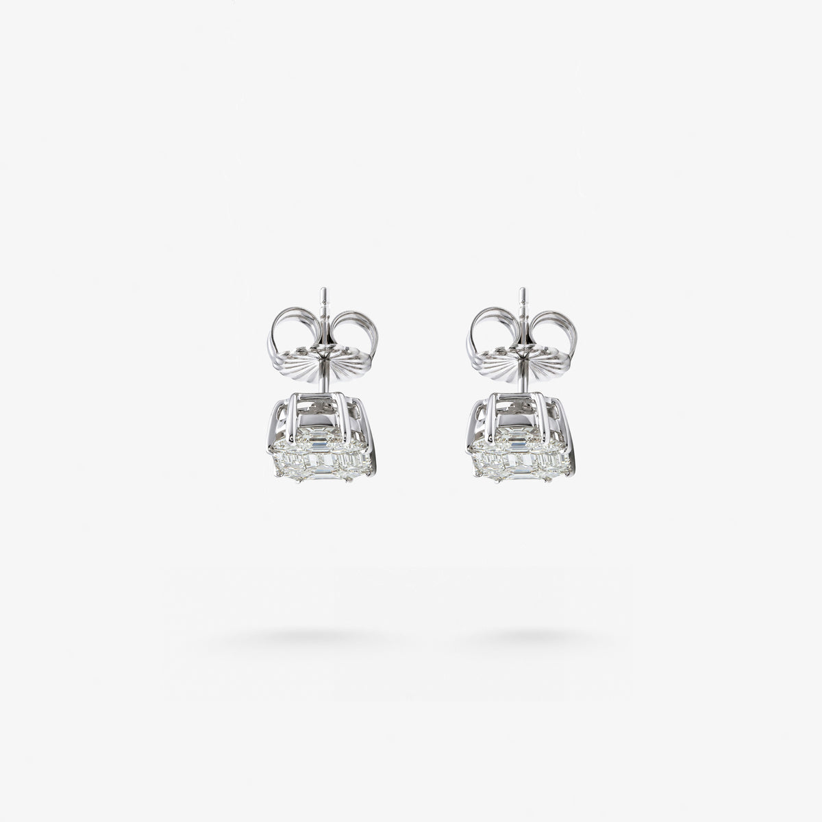 Peter Marco emerald cut and baguette diamond stud earrings, top down view