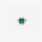 Peter Marco emerald cut emerald and round cut diamond halo ring