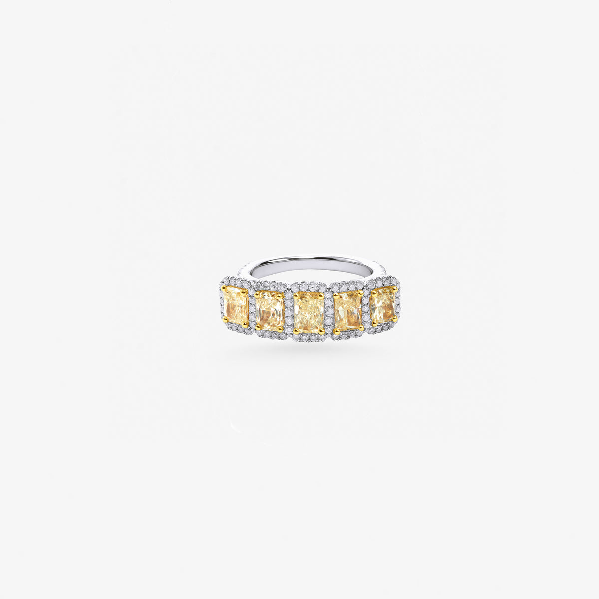 Peter Marco emerald cut yellow diamond and round cut diamond band ring