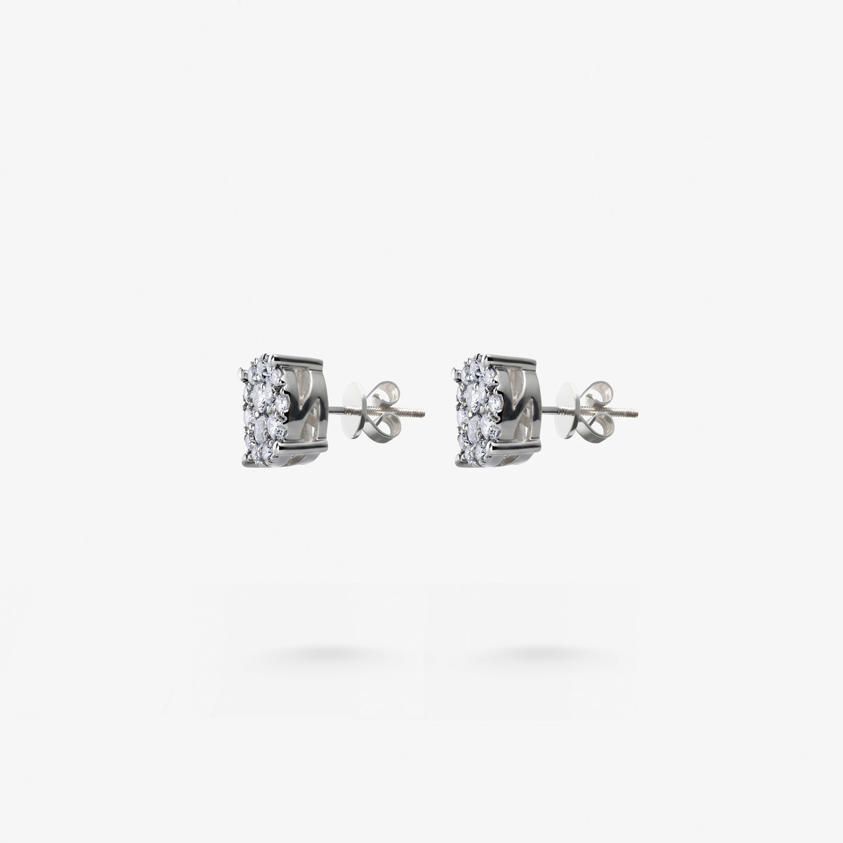 Peter Marco four-prong round cut diamond stud earrings, side view