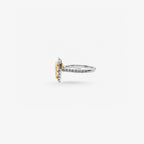 Peter Marco pear cut yellow diamond and round cut diamond halo ring, side view