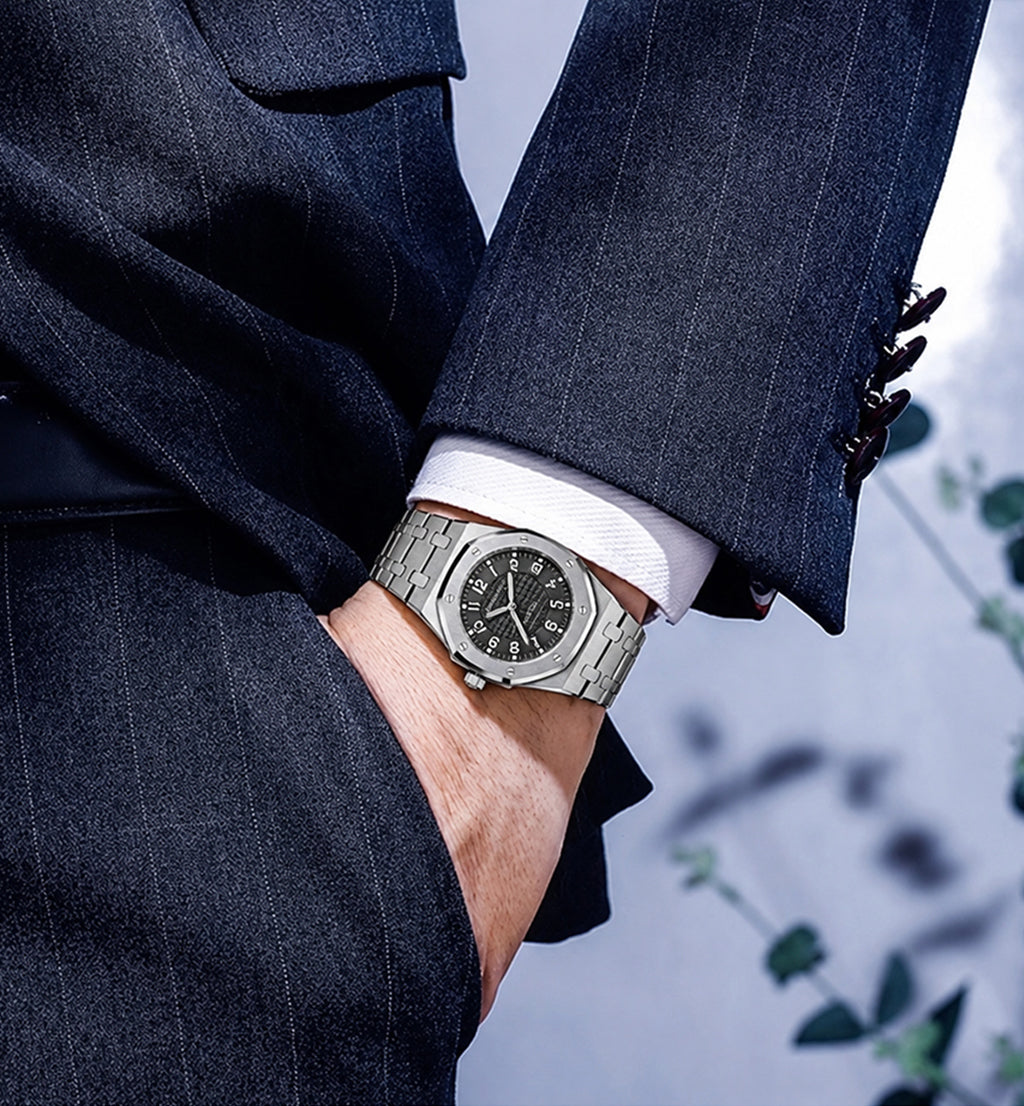 Peter Marco male model wearing a suit with a Royal Oak Audemar Piguet