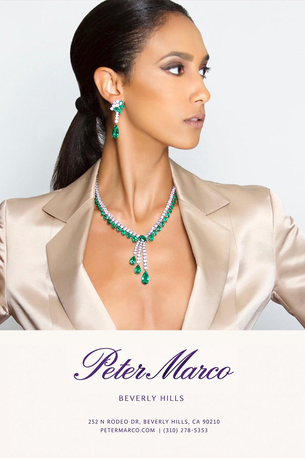 A women wearing earrings a ring also a necklace and bracelet from Peter Marco