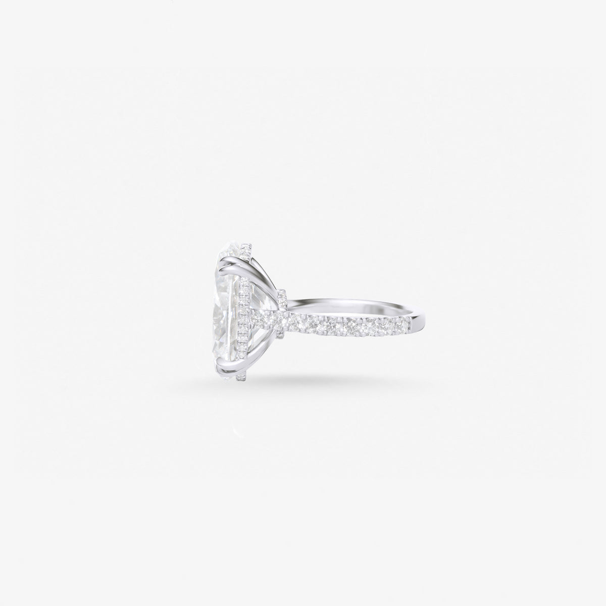 Peter Marco oval cut white diamond ring, side view