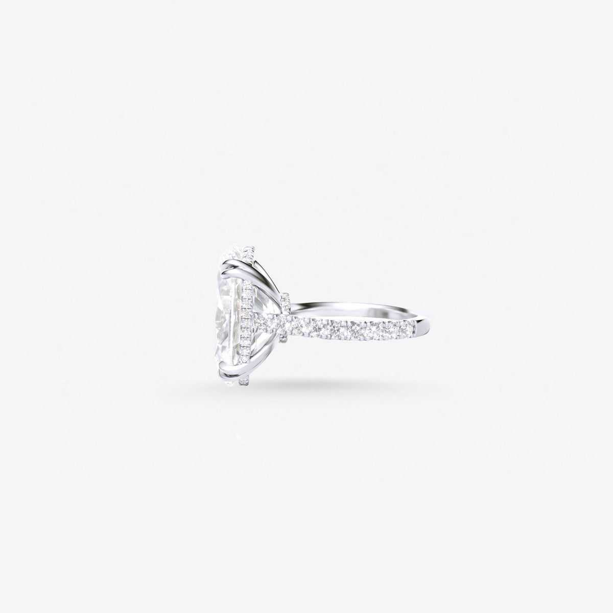Peter Marco oval cut white diamond ring, side view