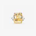 Peter Marco radiant-cut yellow diamond ring with white diamond side accents in a two-tone setting