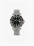 Peter Marco Rolex GMT-Master II stainless steel watch with black dial, grey 24-hour bezel, and Jubilee bracelet.