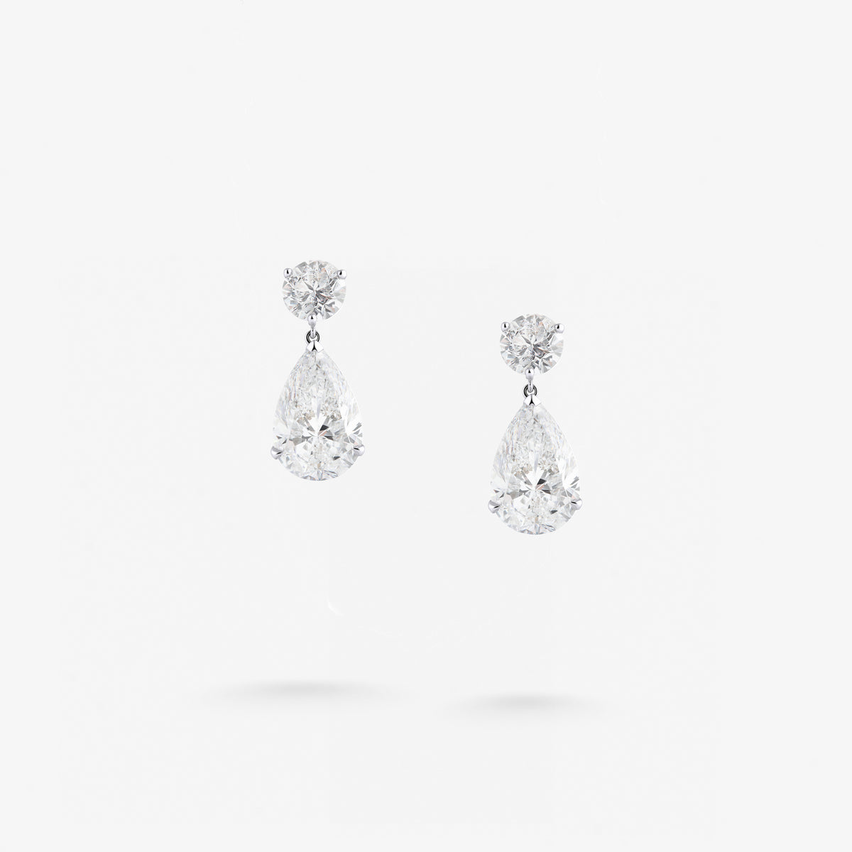 Peter Marco round and pear cut white diamond drop earrings