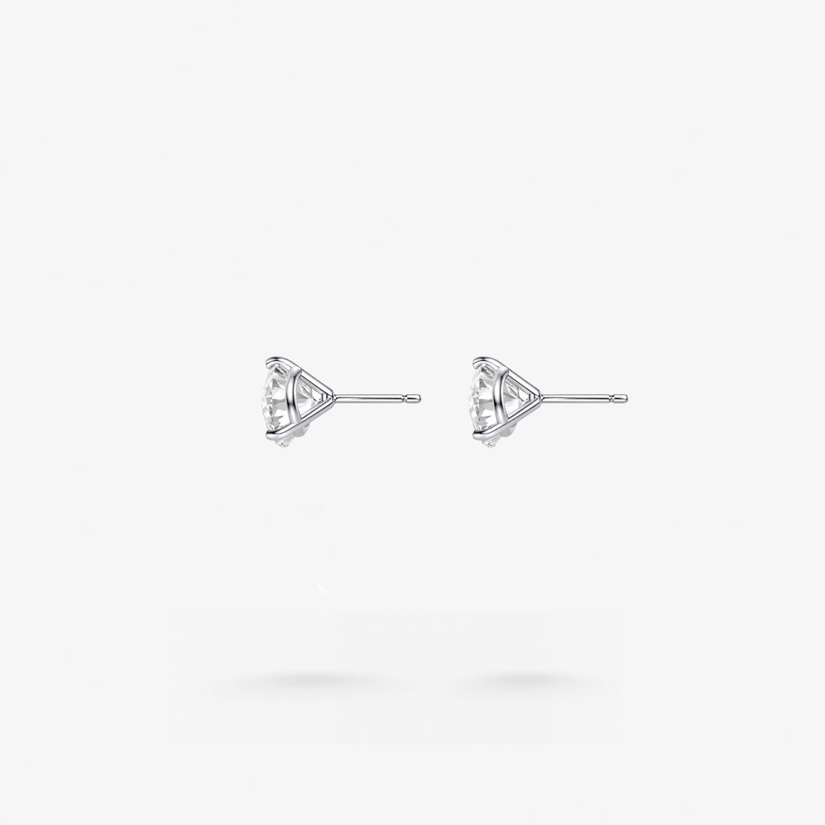 Peter Marco round cut white diamond stud earrings, side view