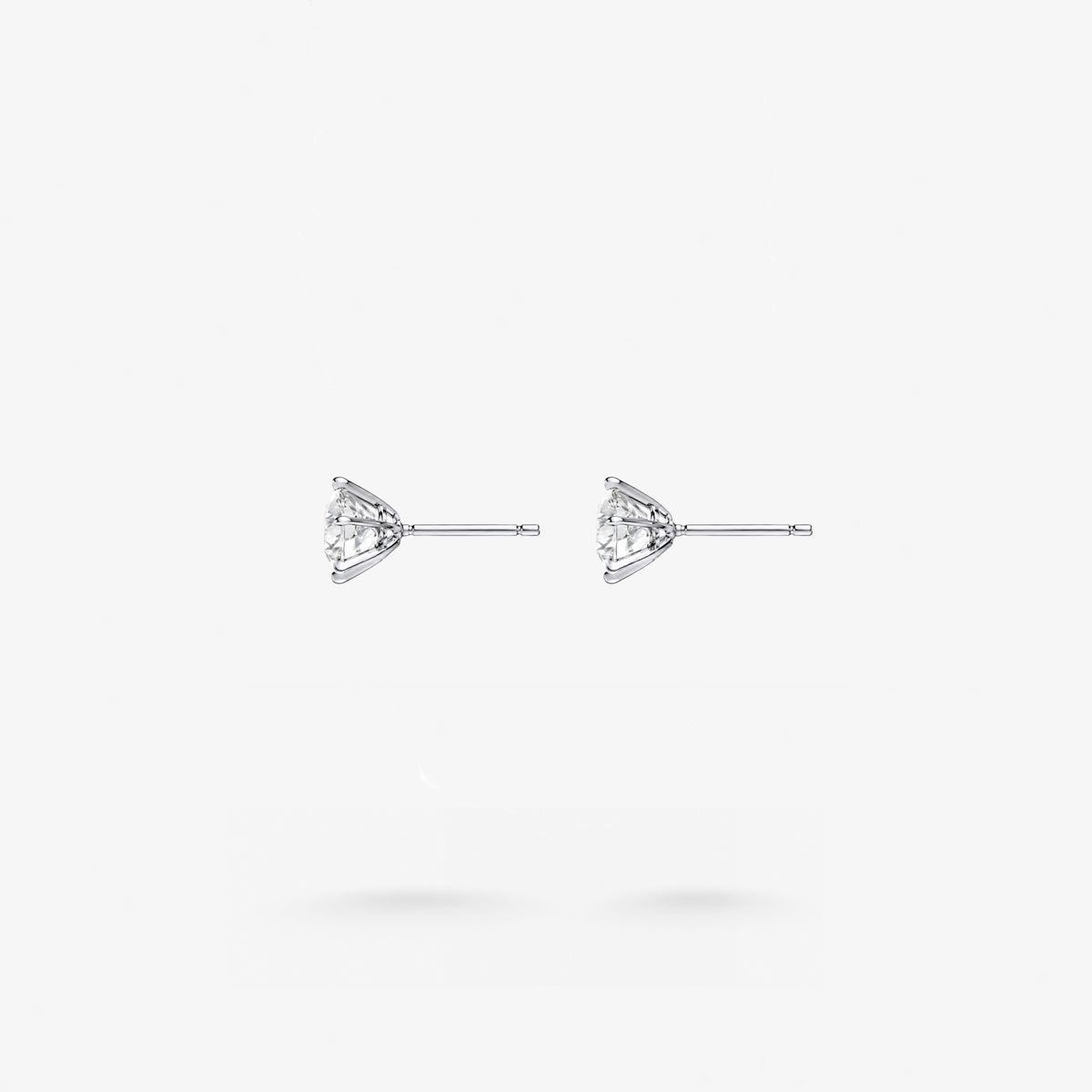 Peter Marco round cut white diamond stud earrings, side view