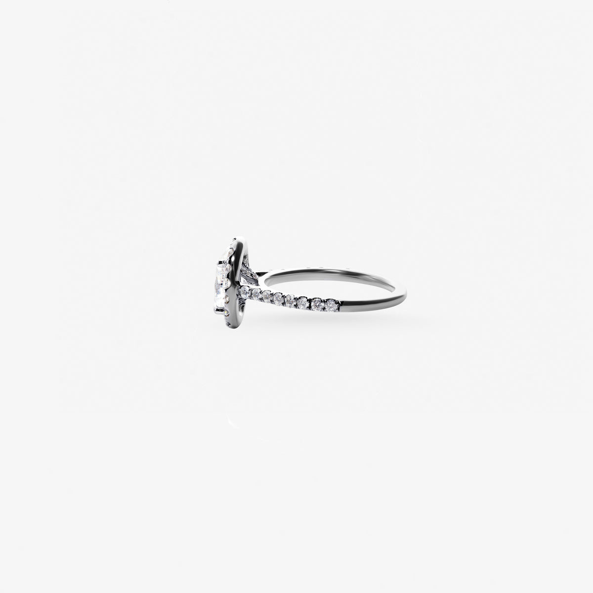Peter Marco white gold oval cut and round cut diamond halo ring, side view