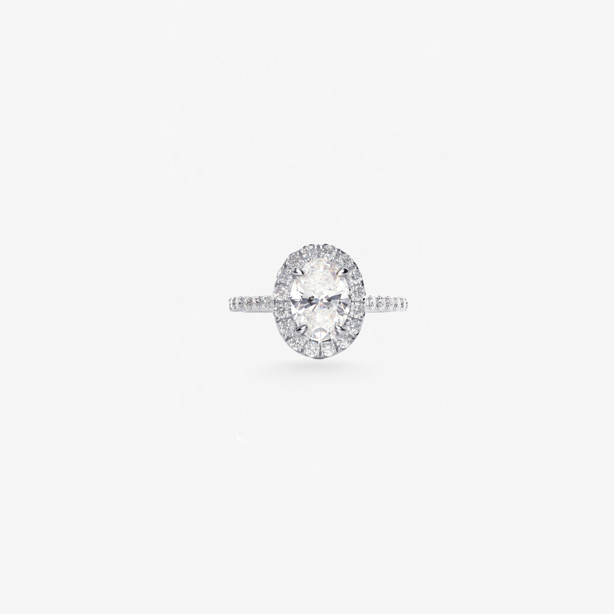 Peter Marco white gold oval cut and round cut diamond halo ring