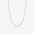 Peter Marco yellow gold three prong graduated round cut diamond necklace